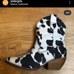 Cow print cowboy boots